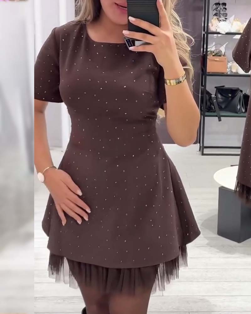 Elegante jurk met glinsterende mesh-patchwork